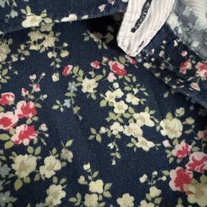 Women’s floral blouse with navy background
